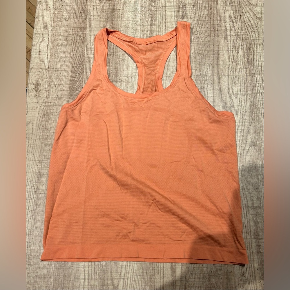 Swiftly Tech Racerback Tank Top
2.0 Sunny Coral *Race Length